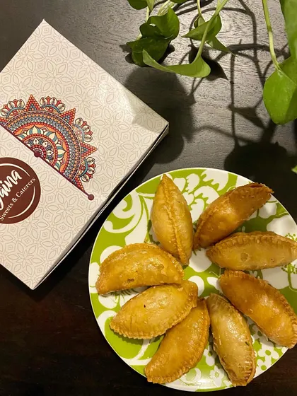 Another look at our Gujiyas, packed and ready to go. The perfect sweet treat to share and celebrate the festival of colours.