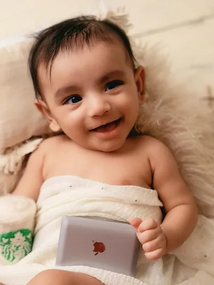 A big smile from our little boss baby. Even newborns give us the most wonderful expressions.