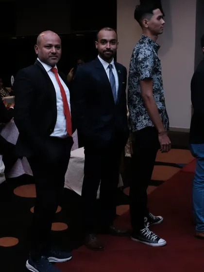 Waiting in the wings at the award night. There is a sense of anticipation and shared purpose among all the attendees and honorees.