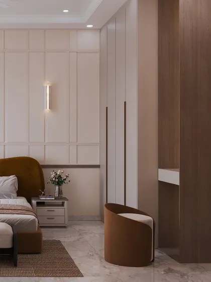 This angle shows the other side of the room, with a simple vanity and chair, maintaining a cohesive and elegant design.