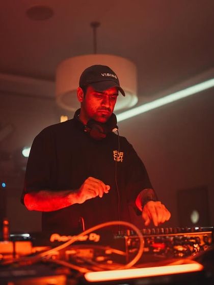 A DJ in full focus, mixing tracks for the crowd. We provide a platform for homegrown acts to deliver spectacular warm-up sets and showcase their skills.