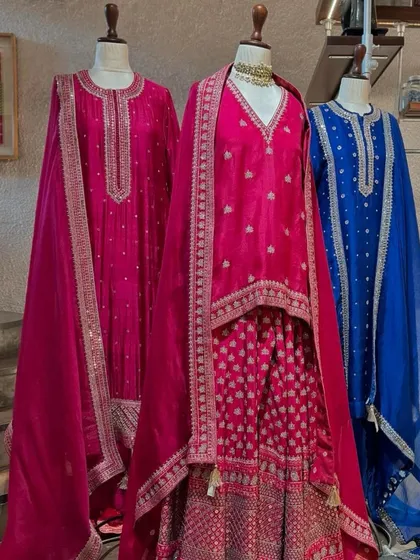 My festive edit includes a range of rich colors. Here, bright pinks and royal blues are detailed with silver embroidery for a striking look.