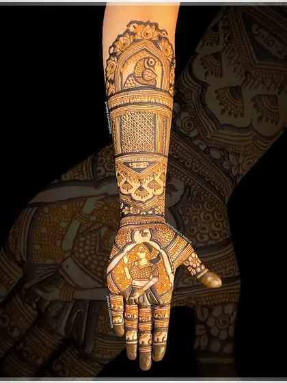 This full arm design features a bride's portrait on the palm, with intricate details extending all the way up the arm, including parrots and floral patterns.