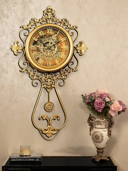 Our vintage gold wall clock is more than just a timepiece; it’s a statement of old-world charm. The ornate detailing and exposed moving gears create a functional work of art that brings elegance to any entryway or living room.