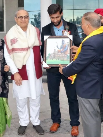 Presenting a framed artwork of Lord Ram during my school's annual day function. It felt great to give back to the community that shaped me.