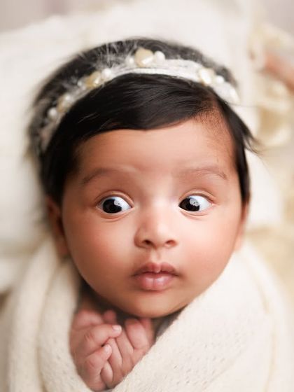 Curious from the very beginning. I love it when I get to capture a baby's wide-eyed wonder as they take in the world around them.