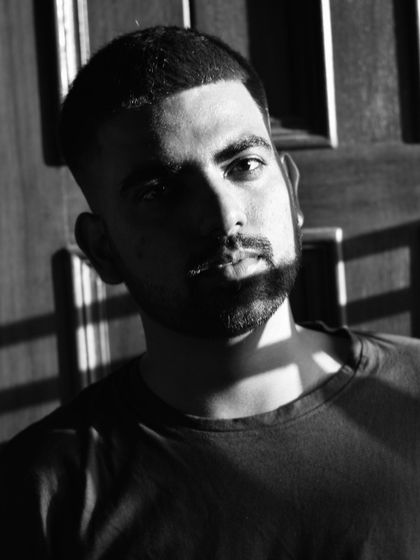 A third variation of the shadow-play self-portrait.