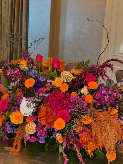 This vibrant Diwali table runner is a riot of color. I mixed bright oranges, pinks, and purples to create a joyful and festive centerpiece for a holiday meal.