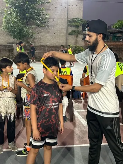 It's all about the hard work paying off. I believe in recognizing every player's progress and dedication, like here at our Under-10 basketball match awards.