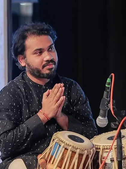 A gallery of cherished moments accompanying the legendary vocalist, Guruji Padma Bhushan Pandit Ajoy Chakraborty ji, at various prestigious festivals.