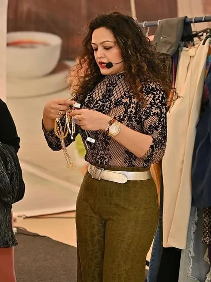 Here I am demonstrating how to select the right accessories to complete an outfit. The right necklace or bracelet can tie a whole look together and express your unique style.