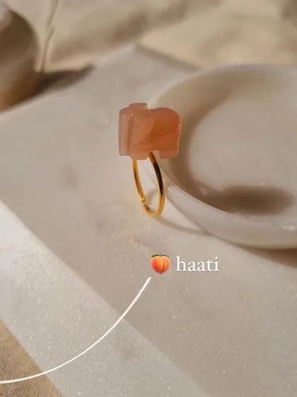 This is my peach moonstone 'haati' elephant ring. I created this piece to bring the energy of inspiration and new beginnings, perfect for a traveler or someone starting a new chapter.