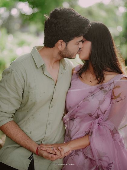 A sweet kiss between Simran and Pranjal. The soft, natural light and gentle colors add to the romantic and dreamy feel of their pre-wedding session.