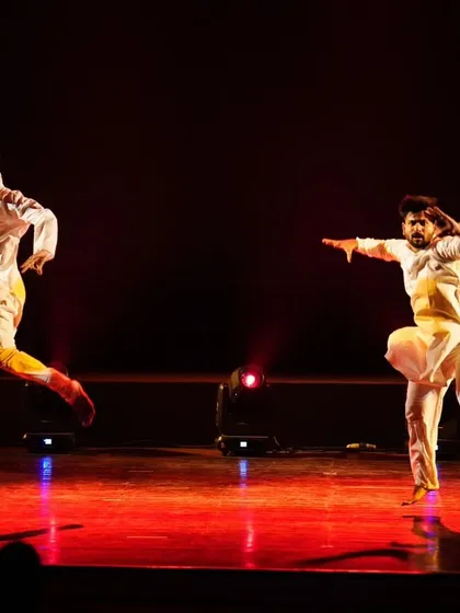 This is the kind of energy we bring to the stage. A powerful, synchronized performance from our "Inquilab" production, this image showcases the dynamic and expressive choreography we create for men's group dances, perfect for a groom's squad or family performance.