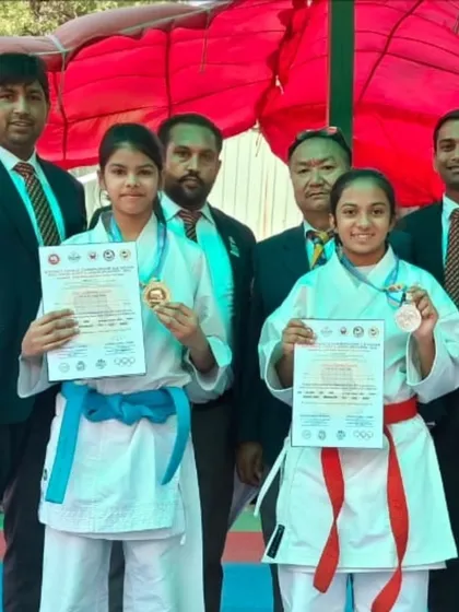 Two of our female athletes with their medals after the Gautam Buddh Nagar district championship.