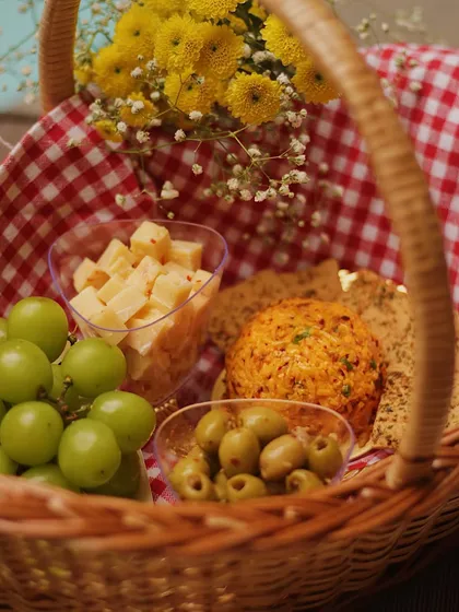 Our picnic basket, complete with fresh flowers, is the perfect companion for any outing. It’s packed with a delicious assortment of our gourmet treats.