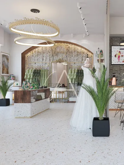This is a retail space we designed for the 'Beige Bag' boutique. Our goal was to create a serene shopping environment using terrazzo flooring, natural stone walls, and warm wood, allowing the products to be the heroes of the space.