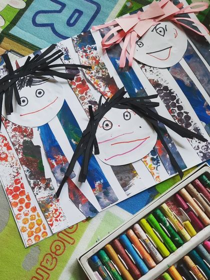 Simple steps, beautiful results. For this self-portrait project, we created a background with painted paper strips and then added our faces and fun paper hair.