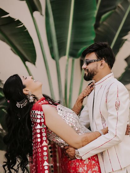 Pure, uninhibited laughter. This is one of my favorite kinds of shots to capture, where the couple is lost in the moment, sharing a genuine laugh that radiates joy.