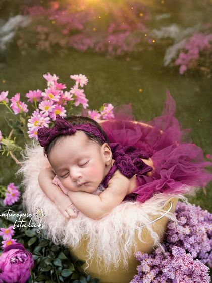 A newborn fairy sleeping in an enchanted garden. We use creative editing and elaborate props to build a fantasy world around your baby, resulting in a breathtaking and unique portrait.