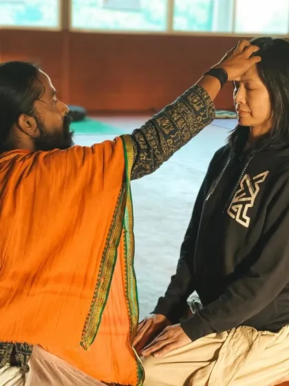 A gentle touch on the third eye can be a profound experience. I offer this blessing to a student to help quiet their mind and deepen their connection to their inner self during meditation.