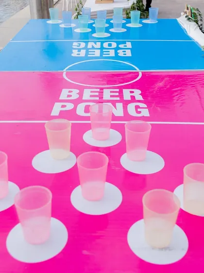A beer pong table ready for some friendly competition. Fun and games are an essential part of a memorable wedding carnival.