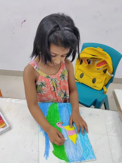 More images of our dedicated young artists at work and proudly displaying their creations.
