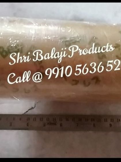 A large roll of clear shrink wrap film, essential for protecting handmade soaps from 'sweating' and keeping them fresh.