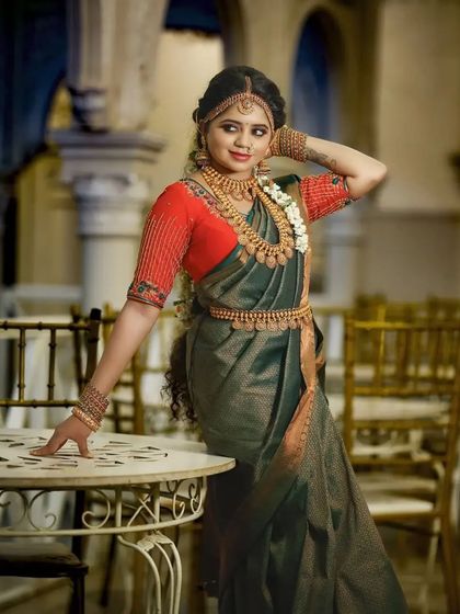 A full-length shot showing how our traditional jewellery complements the entire bridal outfit, creating a cohesive and regal appearance.