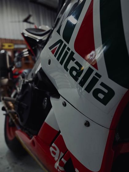 The iconic Alitalia livery on this Aprilia RSV4. This bike is a work of art and a beast on the track, meticulously maintained in our workshop.