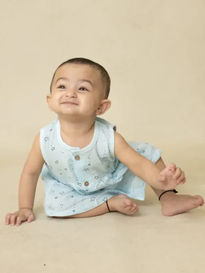 A collection of simple, classic portraits of twin babies. Without props or themes, their individual expressions and connection are beautifully highlighted.