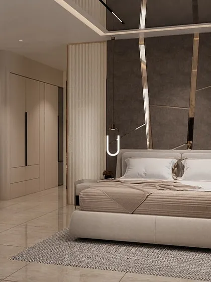 In this large-scale 7500 sq. ft. project, we executed a master bedroom suite that balances luxury with comfort. Our work included installing the marble-finish headboard wall with metal inlays, the custom wardrobe units, and ensuring all electricals for the pendant and accent lighting were perfectly placed.