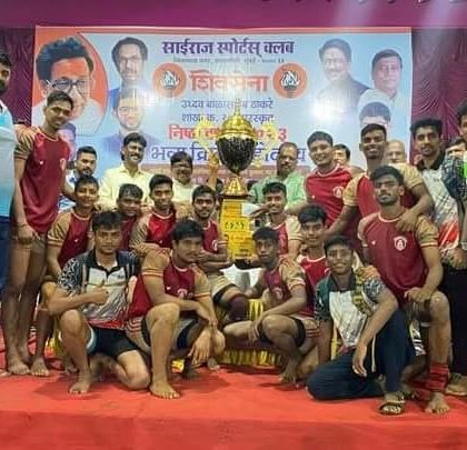 The junior team with the runners-up trophy at the Sairaj Sports Club tournament.