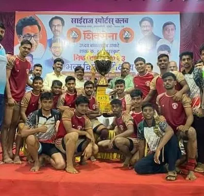 The junior team with the runners-up trophy at the Sairaj Sports Club tournament.