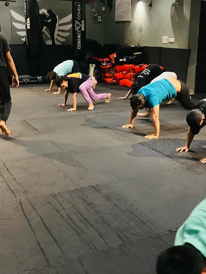 We use dynamic animal flow movements like the bear crawl to build total-body strength, coordination, and agility. This type of functional fitness is key for real-world combat mobility.
