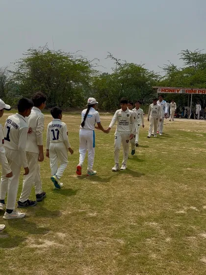 Sportsmanship is key. Players shaking hands after the final match.