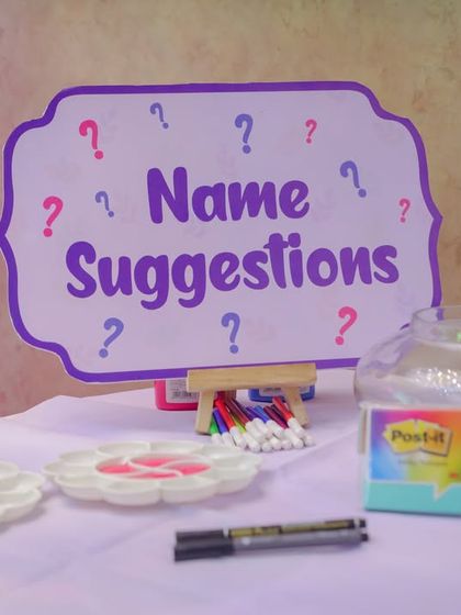 A "Name Suggestions" station is a sweet and interactive way for guests to share their favorite baby names. We set up everything you need, from the sign and pens to a jar for collecting the wonderful ideas.