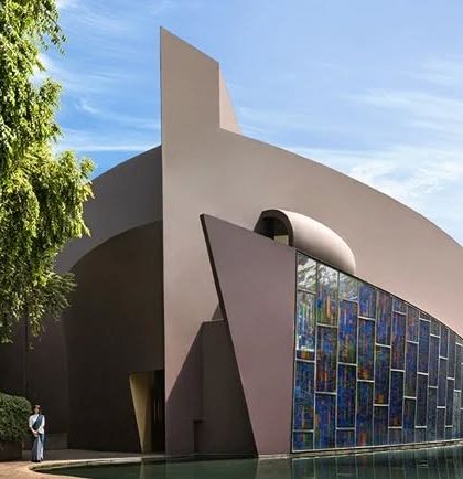 The striking architecture of our spa building, set against the water and greenery, is a testament to our philosophy of blending modern luxury with natural harmony.