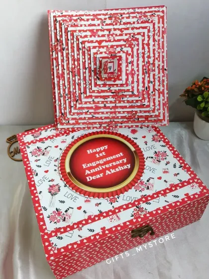 Pamper your partner with this amazing box full of surprises, including pop-up cubes and a pyramid card album of your favorite memories.
