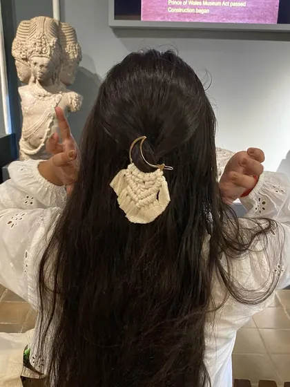 Our Pinterest-inspired macrame moon hair clip is a beautiful and unique hair accessory. It combines a metal moon with delicate macrame knotting for a celestial, bohemian look.