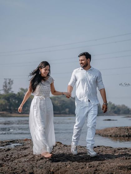 A duplicate of image 115, this shot perfectly encapsulates the feeling of a joyful journey together, which is what a pre-wedding shoot is all about.