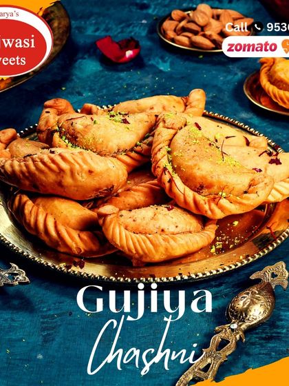 This is my Gujiya Chasni, a festive special. These fried pastries are filled with khoya and dry fruits, then soaked in sugar syrup for an extra layer of sweetness.
