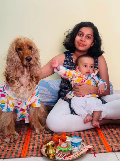 A beautiful portrait of the two brothers with their cousin, celebrating Rakhi with a traditional thali.