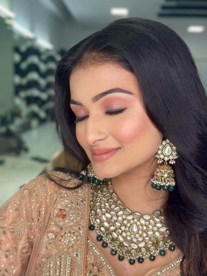 A soft, peachy monochrome look perfect for a daytime wedding function. Learning monochrome makeup is a key part of my curriculum as it teaches color harmony.