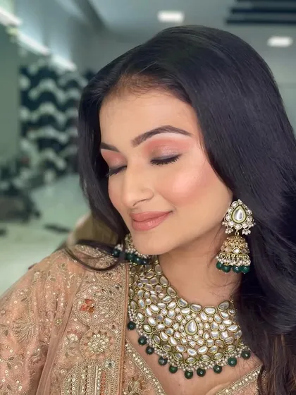 A soft, peachy monochrome look perfect for a daytime wedding function. Learning monochrome makeup is a key part of my curriculum as it teaches color harmony.