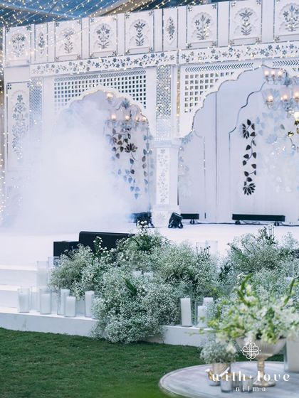 The Thikri stage enveloped in theatrical smoke, creating a dramatic and dreamy effect for a performance. This shows how we use lighting and effects to enhance the mood of the event.