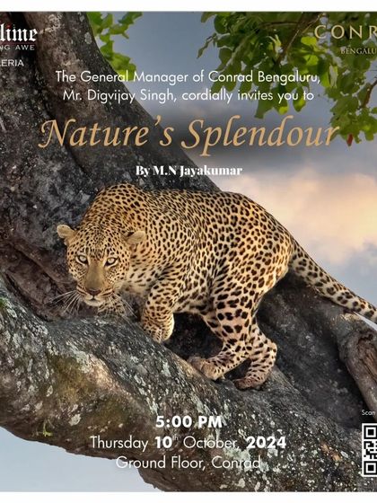 The invitation for 'Nature's Splendour' at the Conrad Bengaluru, featuring a powerful photograph of a leopard on a tree.