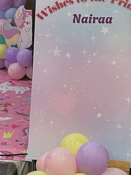A personalized "Wishes for the Princess" board for a unicorn-themed party, where guests can leave messages.