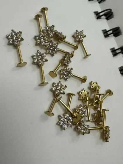 A selection of our flower-shaped studs, perfect for a variety of ear piercings. These are made from sterilized, body-safe materials.