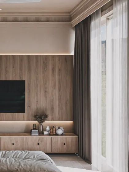 A shot of the TV wall, showing the simple yet elegant wood paneling and floating console.